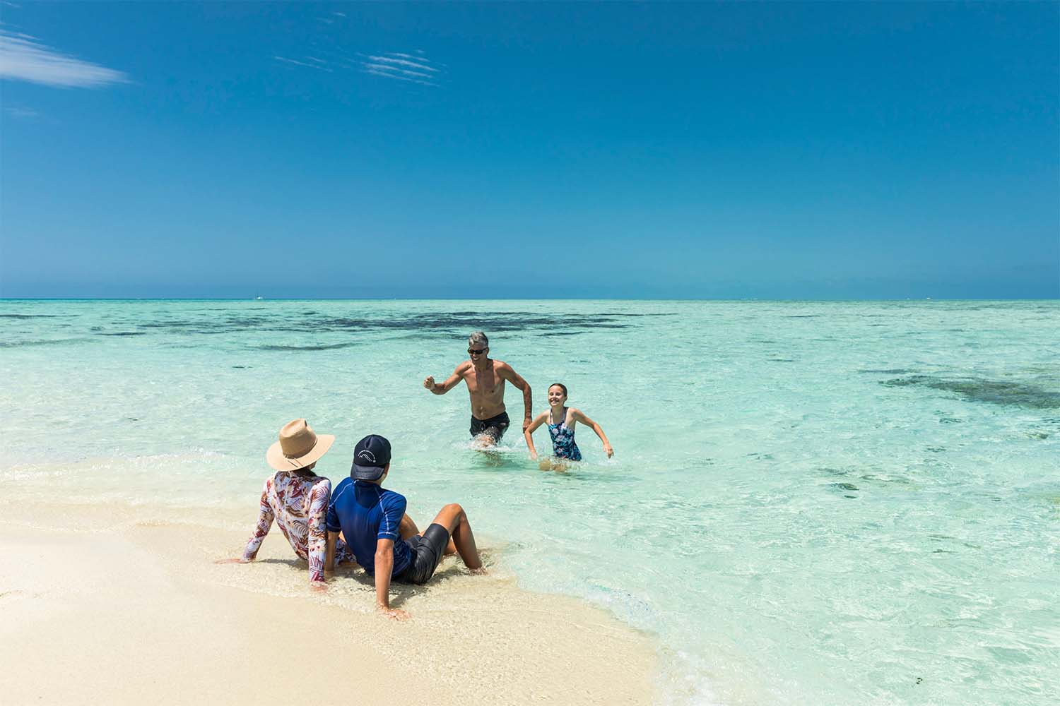Family enjoying a reef tour with ocean freedom
