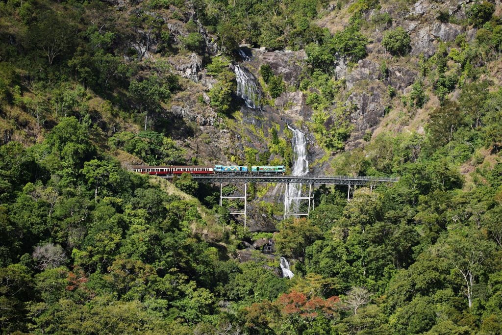 Kuranda Scenic Railway passing Stoney Creek Falls