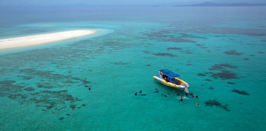 The Ocean Safari boat, moored at beautiful Mackay Reef.