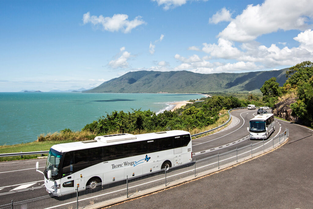 Tropic Wings bus travelling around Tropical North Queensland