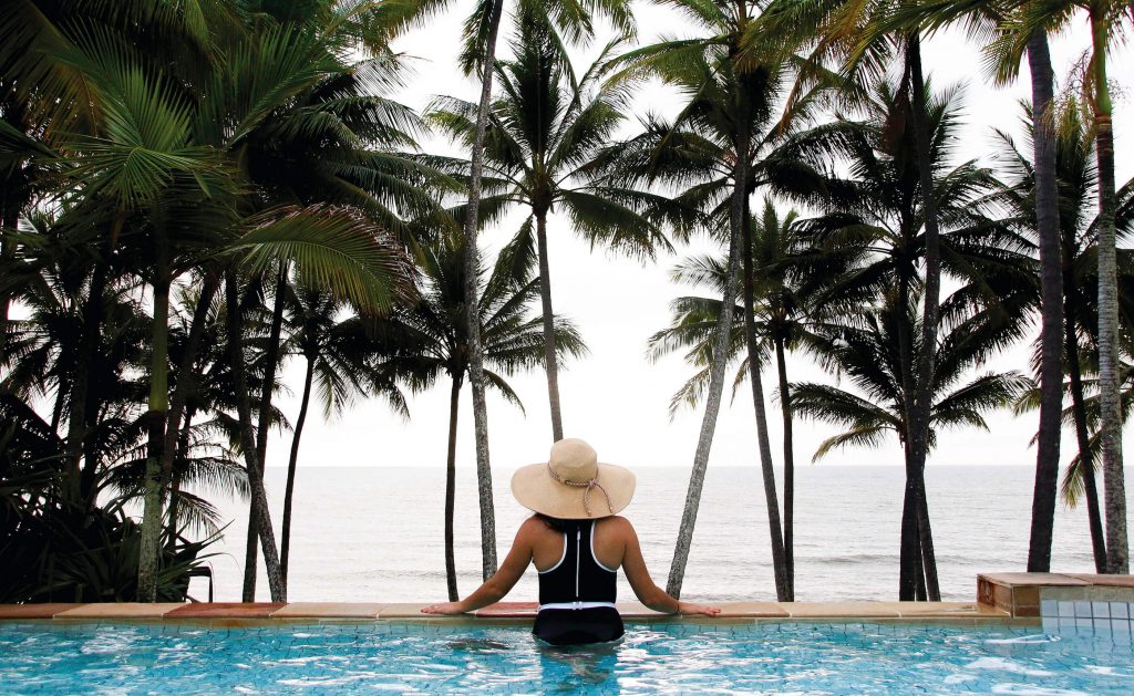 Woman in pool at Alamanda