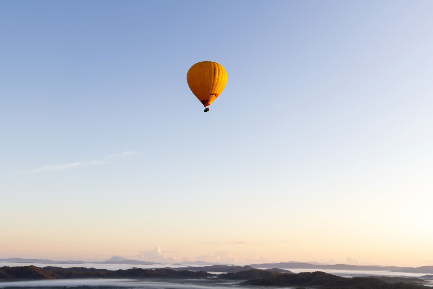 hot air balloon over mareeba at sunrise